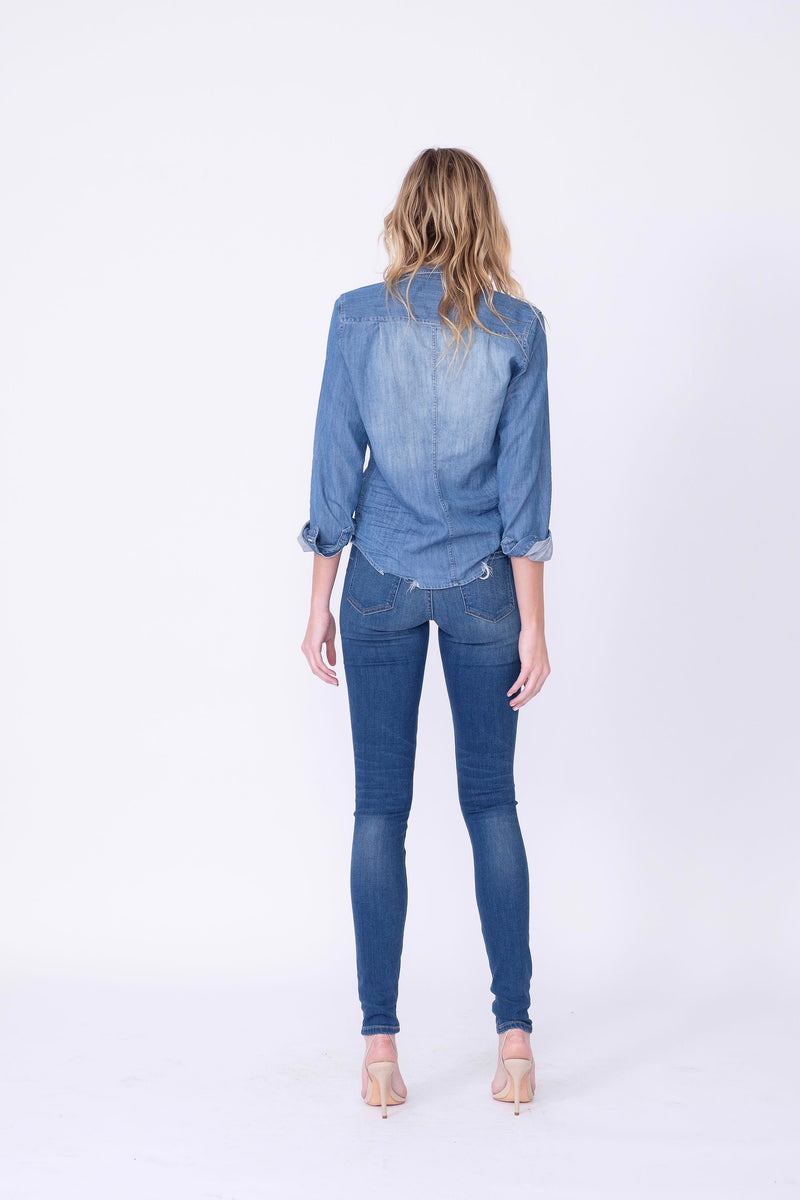 Back View of Midheaven's High-Rise Indigo Skinny    Details: Model is 6’ and is wearing 4" heels. Rise: 10” Inseam: 35.5” Leg Opening: 9.5” Fabric contents: 98%Cotton - 2%Elastane