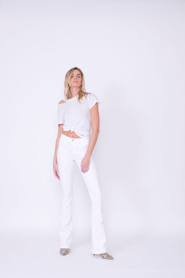 Front View of Midheaven's Mid-Rise White Flare     Details: Model is 6’ and is wearing 4" heels. Rise: 9.75” Inseam: 38” Leg Opening: 21” Fabric contents: 98% Cotton - 2% Elastane NOTE: Fabric will stretch with wear. Consider sizing down.