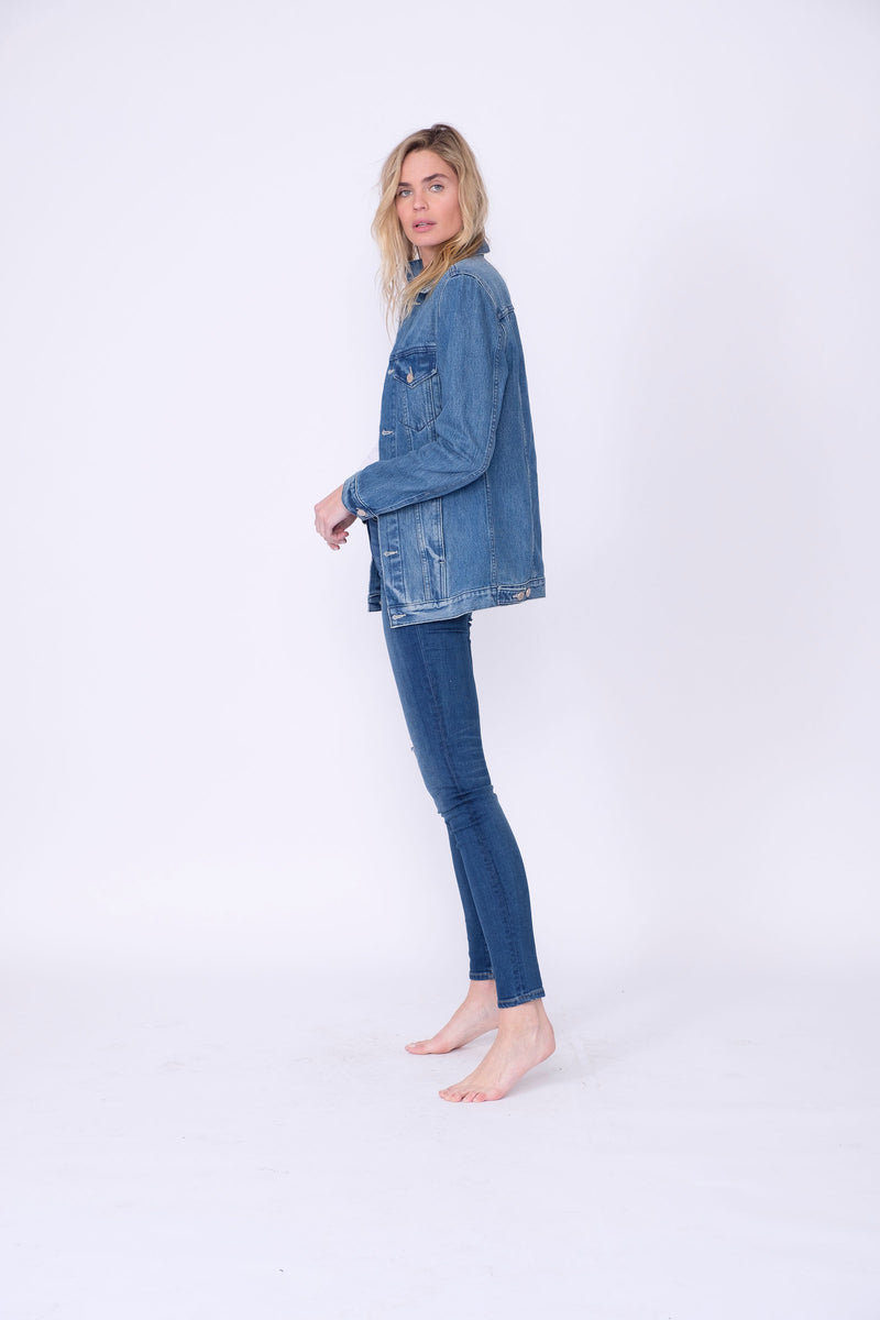Side View of Midheaven's Long Line Denim Jacket in Indigo Details: Fabric Contents 100% Cotton