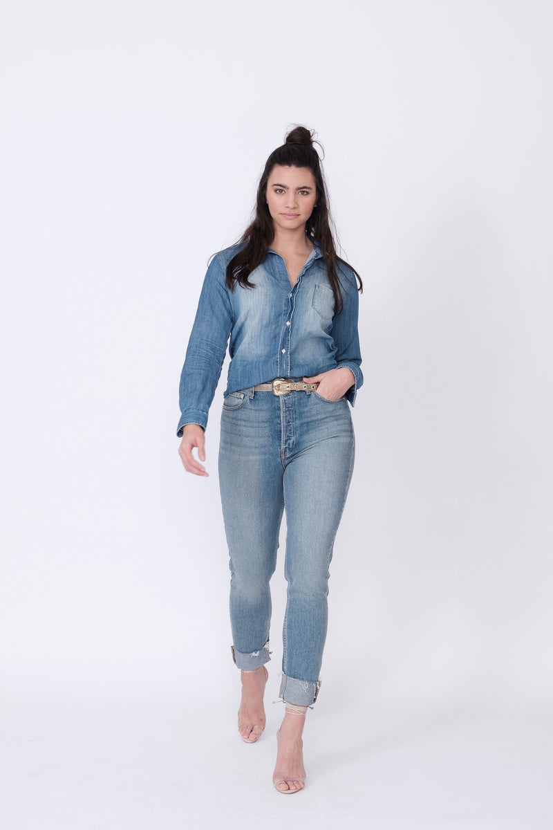 Front View of Midheaven's High-Rise Vintage Wash Button Fly Skinny w/ Raw Hem    Details: Model is 5' 9" and is wearing 4" heels. Rise: 10 3/4” Inseam: 28” Leg Opening: 10.5” Fabric contents: 98% Cotton - 2% Elastane