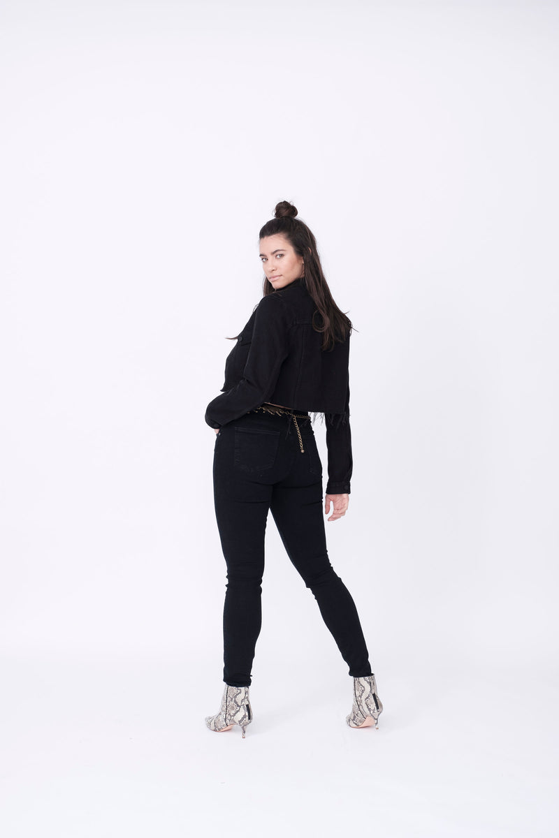 Back View of Midheaven's Cropped Denim Jacket in Black  Details: Fabric contents 100% Cotton