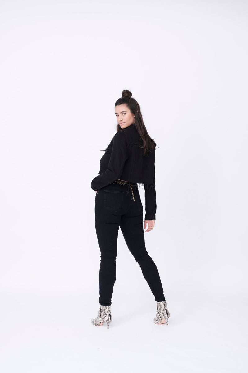 Back View of Midheaven's Cropped Denim Jacket in Black Details: Fabric contents 100% Cotton