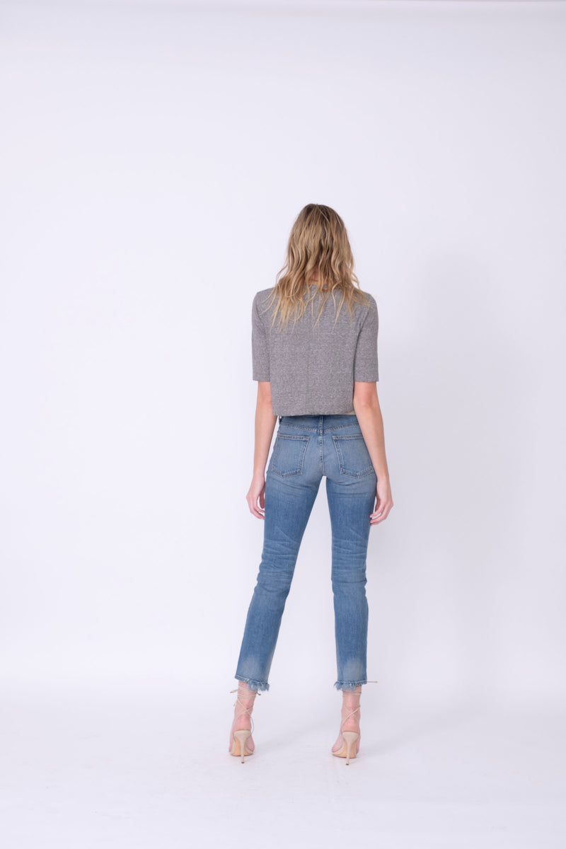 Back View of Midheaven's Relaxed High-Rise Straight Leg Details: Second Model: 6' - Wearing 4" Heels Rigid denim will relax with wear. Considering going down one size.  Rise: 10" Inseam: 30" Leg opening: 14” Fabric Contents:  98% Cotton - 2% Elastane