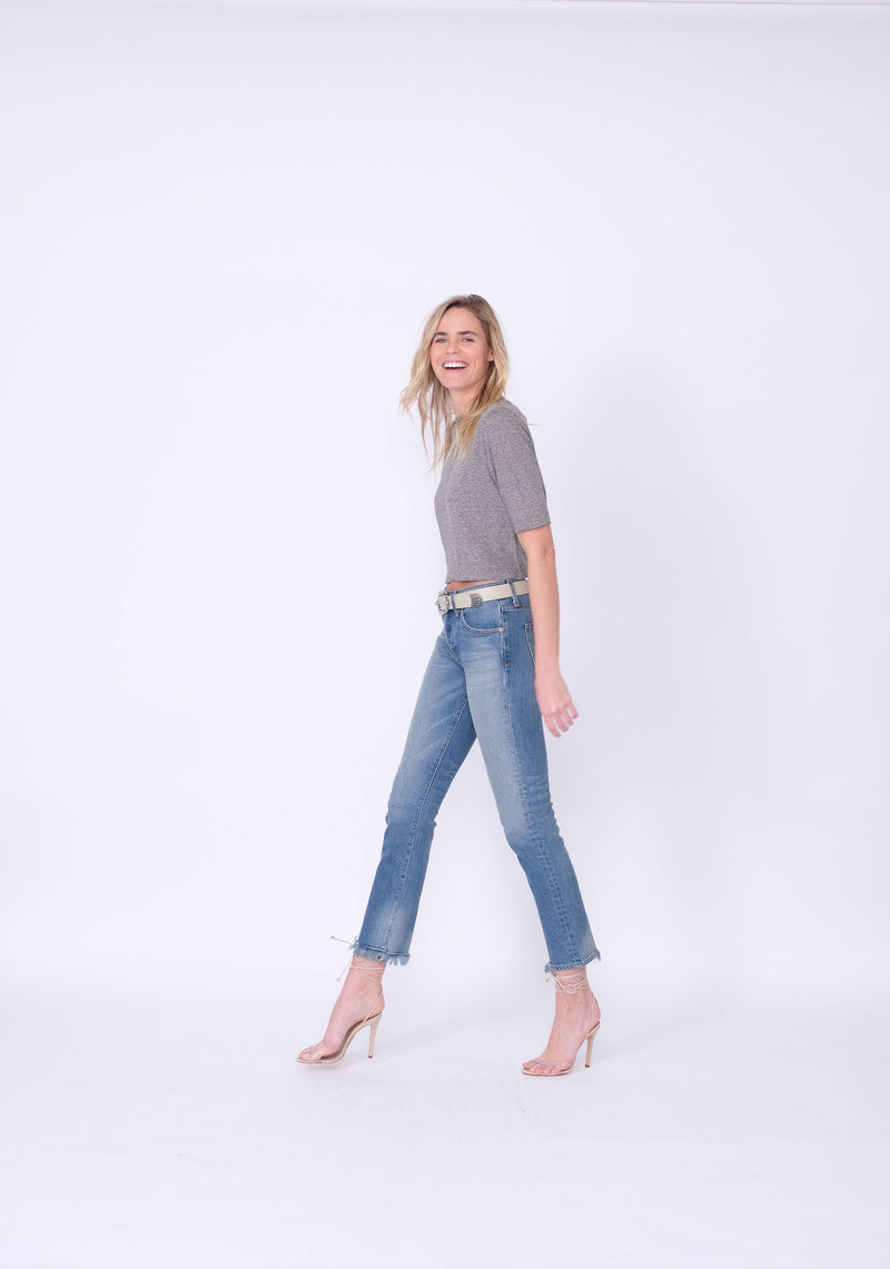 Side View of Midheaven's Relaxed High-Rise Straight Leg Details: Second Model: 6' - Wearing 4" Heels Rigid denim will relax with wear. Considering going down one size.  Rise: 10" Inseam: 30" Leg opening: 14” Fabric Contents:  98% Cotton - 2% Elastane