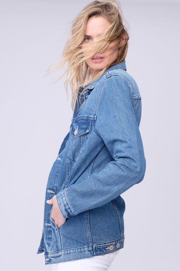 Side View of Midheaven's Long Line Denim Jacket in indigo  Details: Fabric Contents 100% Cotton