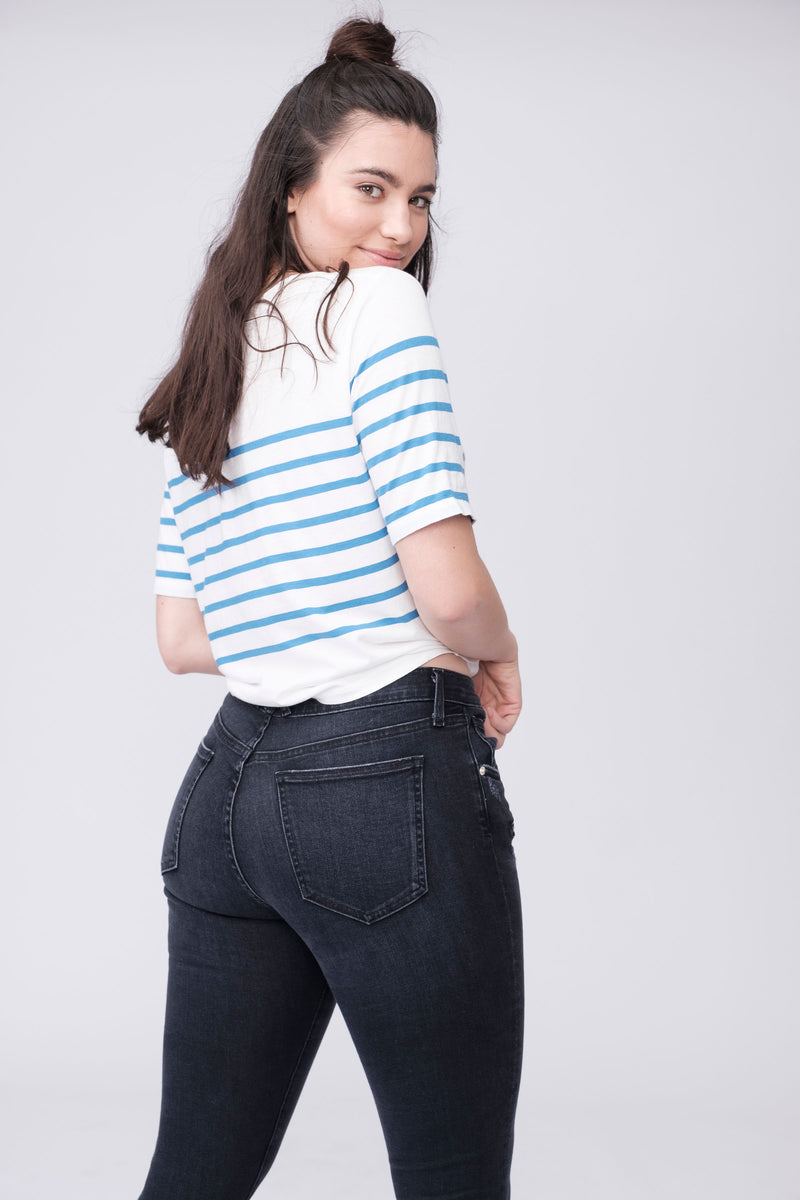 Back View Up Close of Midheaven's Antique Black Skinny w/ Moto Zippers  Details:  Model is 5'9" and is wearing 3" heels Rise: 8 1/2" Inseam: 30” or 34" (Choose Your Inseam Below) Leg opening: 10.5” Fabric Contents:  98% Cotton - 2% Elastane