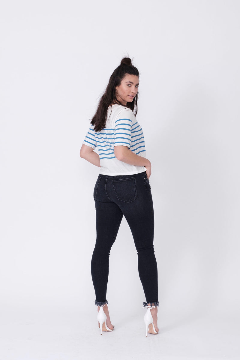 Back View of Midheaven's Antique Black Skinny w/ Moto Zippers  Details:  Model is 5'9" and is wearing 3" heels Rise: 8 1/2" Inseam: 30” or 34" (Choose Your Inseam Below) Leg opening: 10.5” Fabric Contents:  98% Cotton - 2% Elastane